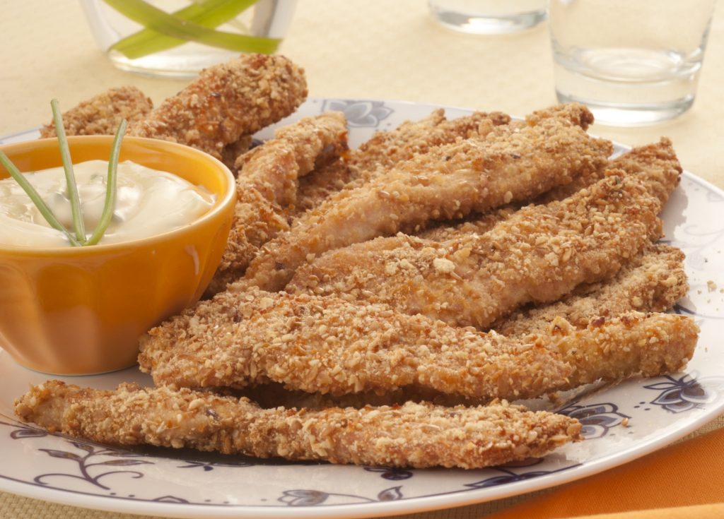 Foto de Iscas assadas de frango com molho de ervas